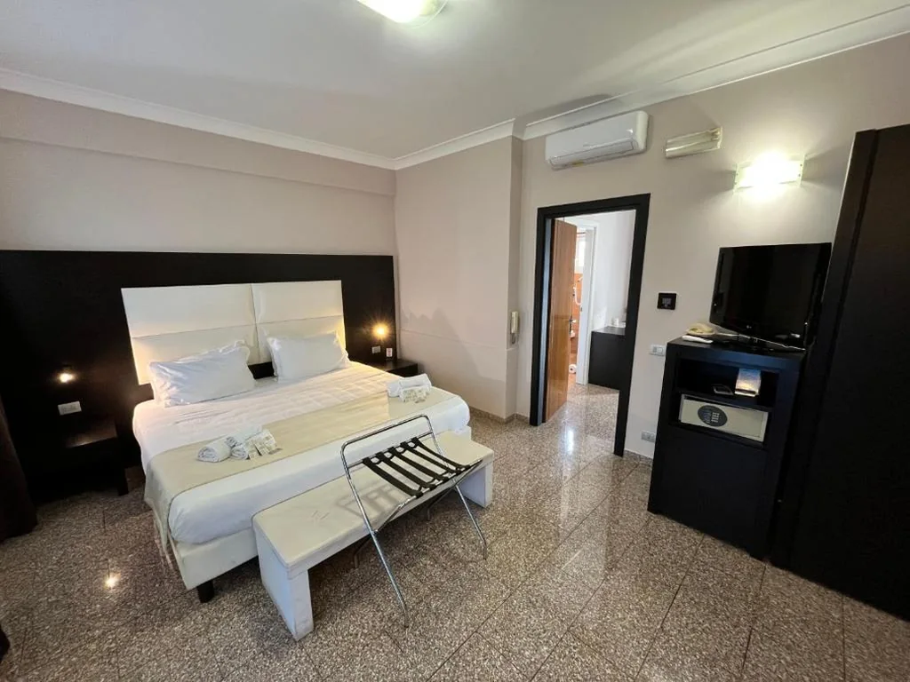 Camera Matrimoniale Deluxe — EH Suites Rome Airport Euro House Hotels