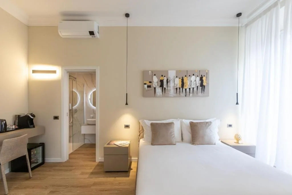 Camera Matrimoniale Deluxe — Elegantia Luxury Rooms
