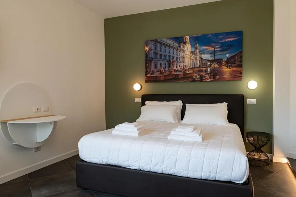 Camera Matrimoniale Deluxe — Flora Guest House