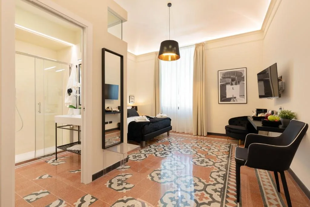 Camera Matrimoniale Deluxe — Foresteria di Piazza Cavour – Luxury Suites & Guest House