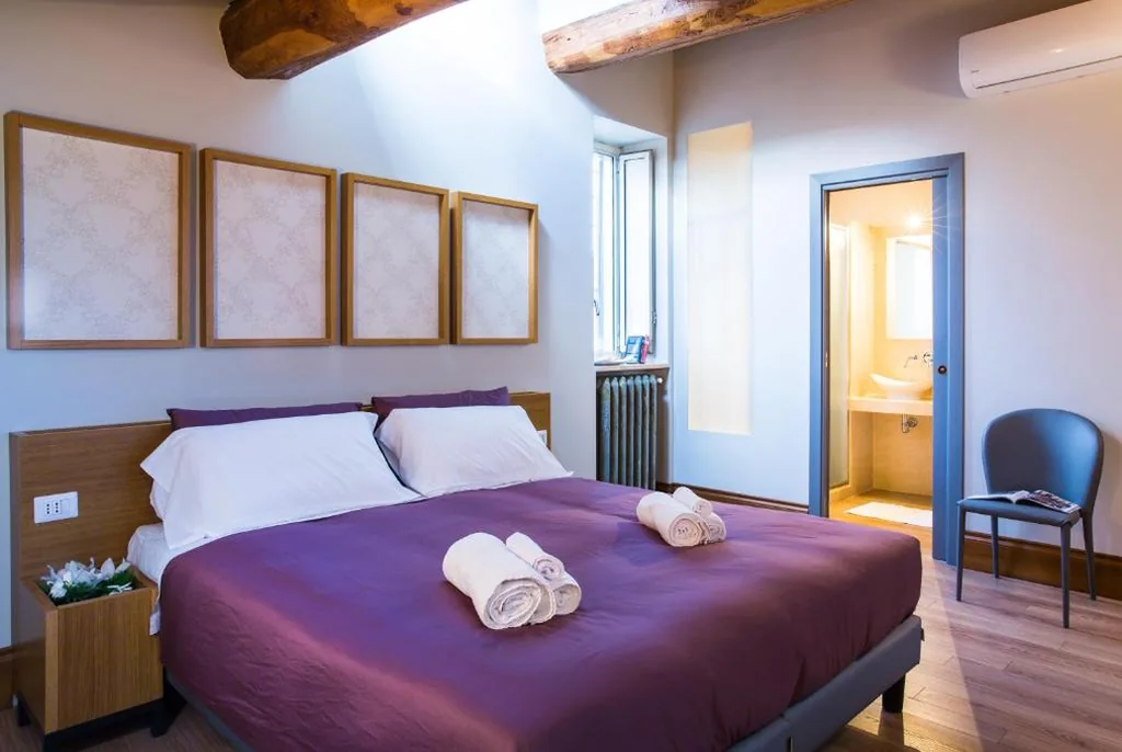 Camera Matrimoniale Deluxe — Grand Master Suites