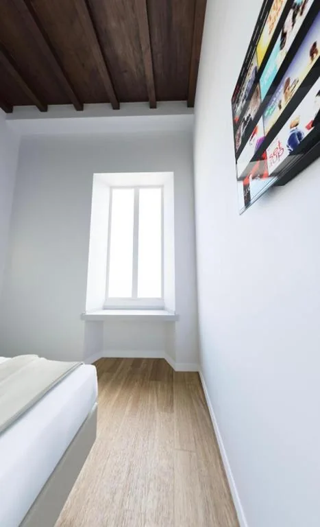 Camera Matrimoniale Deluxe — Maison Romana Trastevere Suites