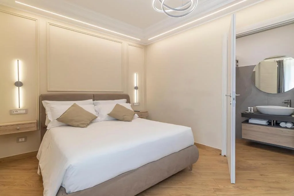 Camera Matrimoniale Deluxe — Mom Apartment Rooms&Suites