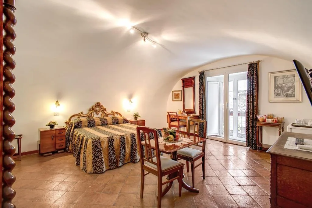 Camera Matrimoniale Deluxe — Navona Gallery Suites
