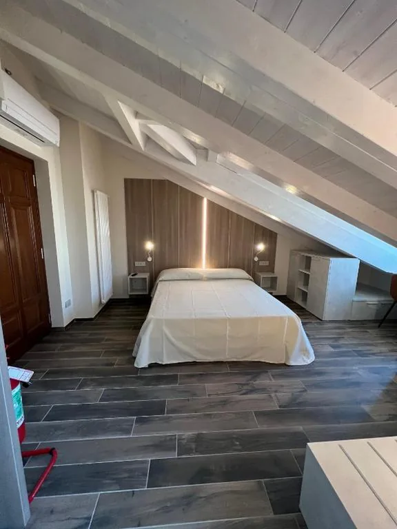 Deluxe Double Room — Osteria Senza Fretta Rooms for Rent