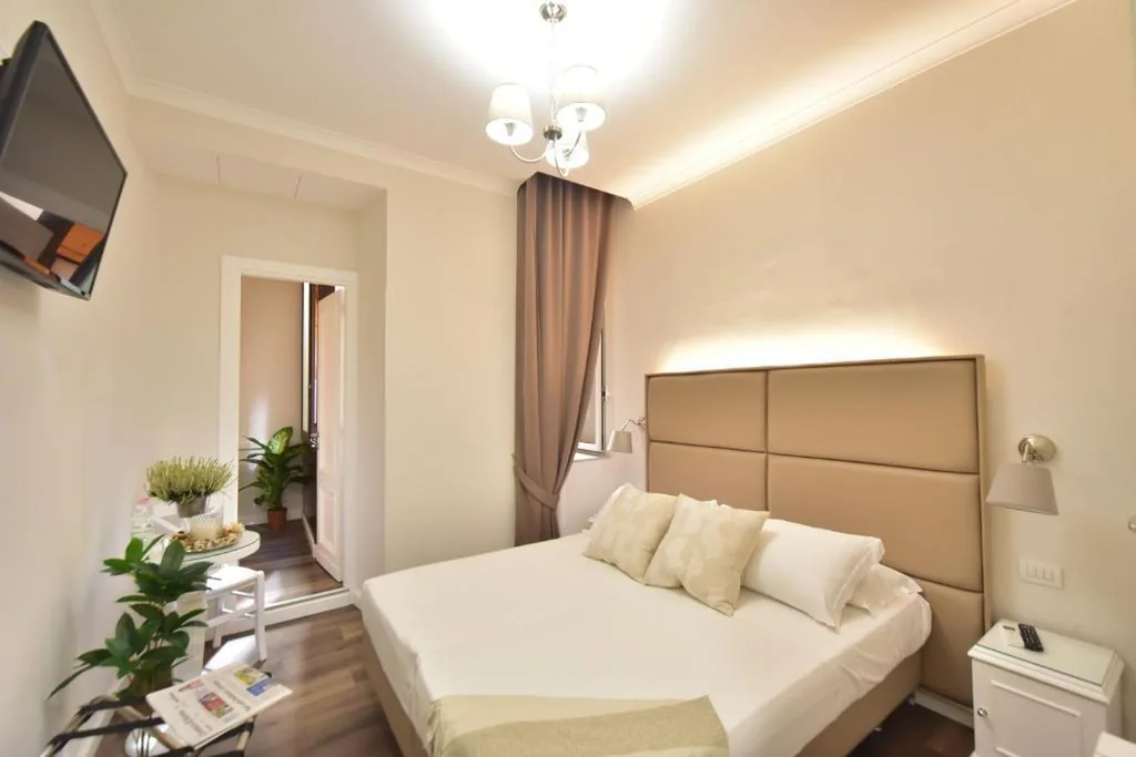 Camera Matrimoniale Deluxe — Sacconi Palace Suite Roma