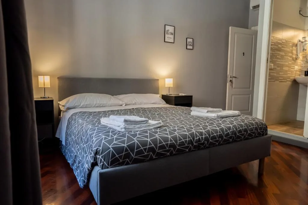 Camera Matrimoniale Deluxe — Trastevere Guestrooms