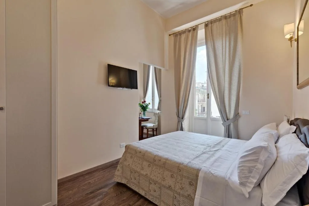Camera Matrimoniale Deluxe — Vatican Domus Luxury Rooms