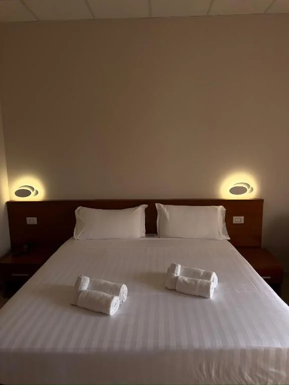 Double/Twin Room with Single Beds — Casa Per Ferie Canobi 18