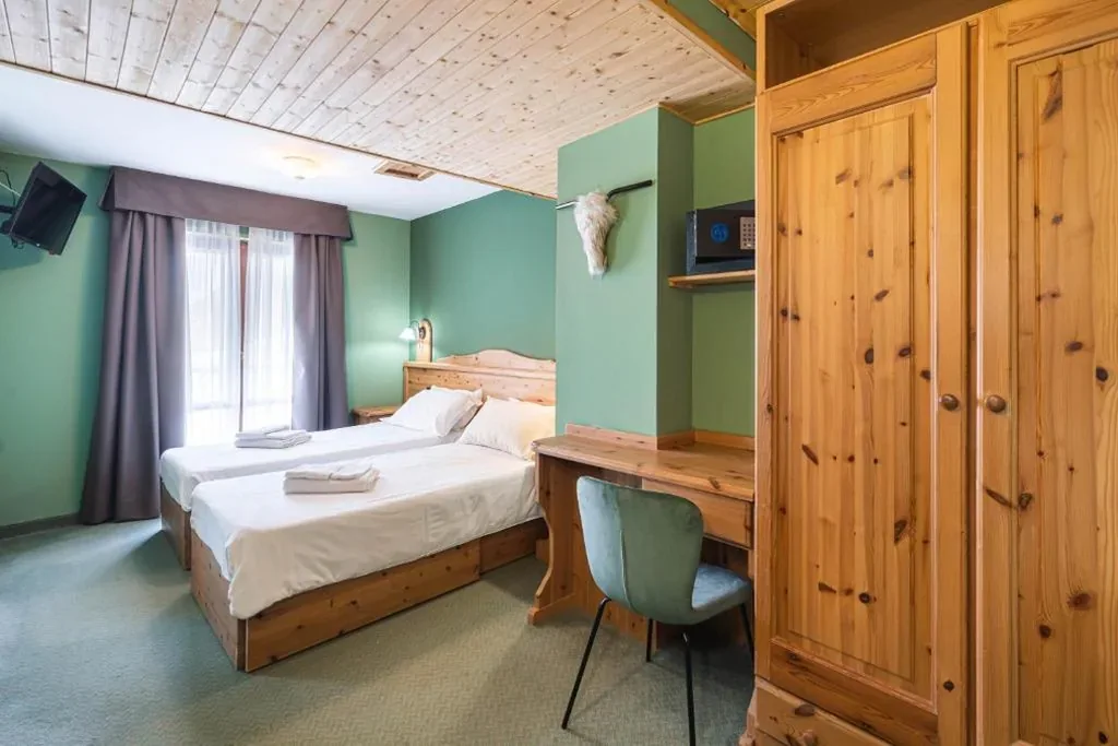 Camera Matrimoniale/Doppia con Letti Singoli — CHALET DES ALPES