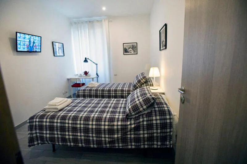Double/Twin Room with Private Bathroom — Fellini