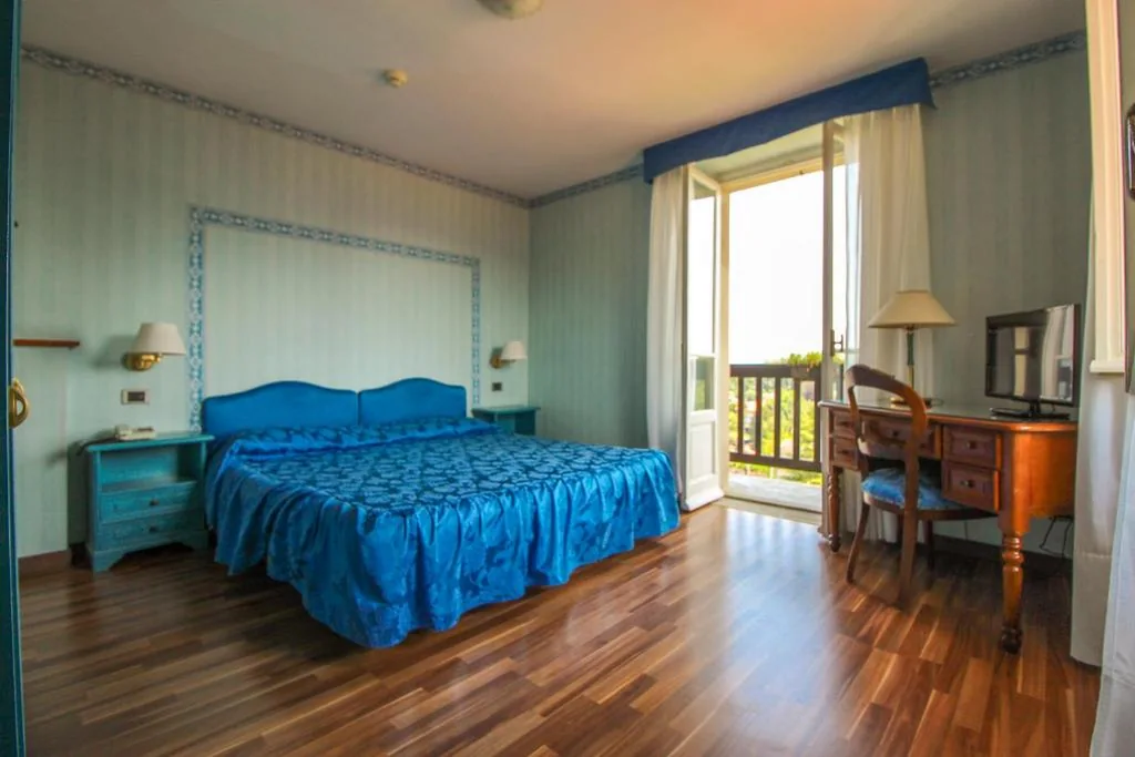 Camera Matrimoniale/Doppia con Letti Singoli con Balcone — Hotel Moderno