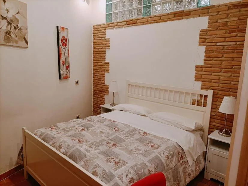 Camera Matrimoniale/Doppia con Letti Singoli con Bagno Privato — il CAPITELLO