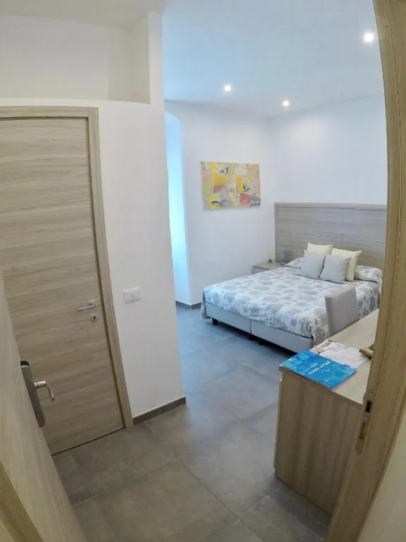 Camera Matrimoniale/Doppia con Letti Singoli con Bagno Privato — Mare dentro rooms