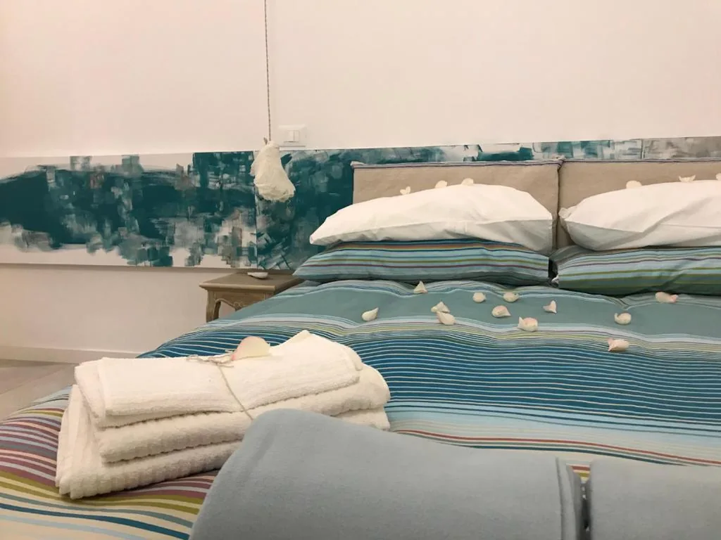 Camera Matrimoniale/Doppia con Letti Singoli con Bagno Privato — Tempo Lento