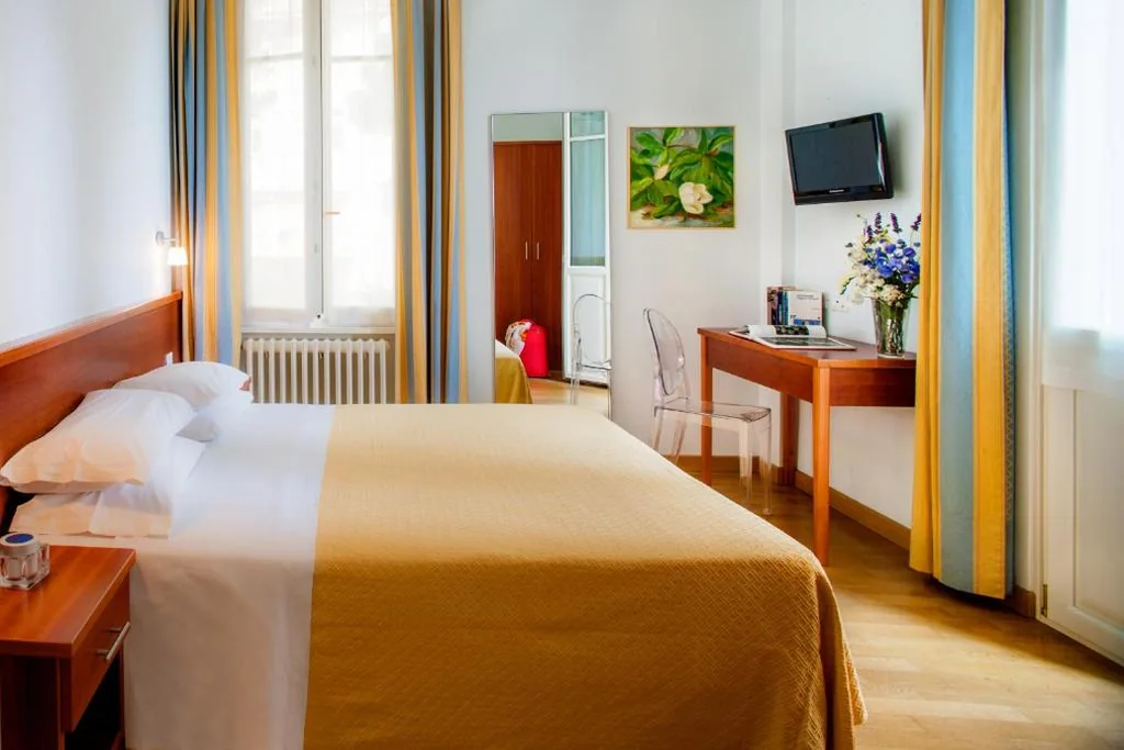 Double/Twin Room with Side Sea View — Hotel Beau Sejour