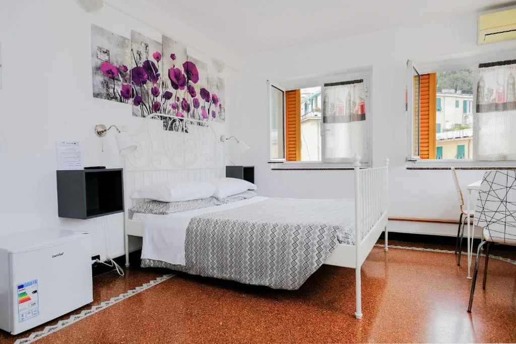 Camera Matrimoniale/Doppia con Letti Singoli — Hotel Caffaro