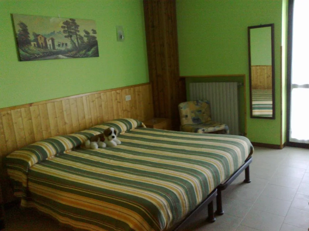 Camera Matrimoniale/Doppia con Letti Singoli — Hotel La Capannina