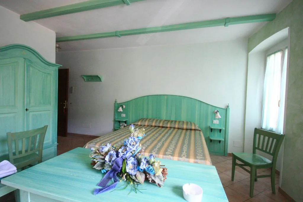 Camera Matrimoniale/Doppia con Letti Singoli nella Dependance — Albergo Belvedere
