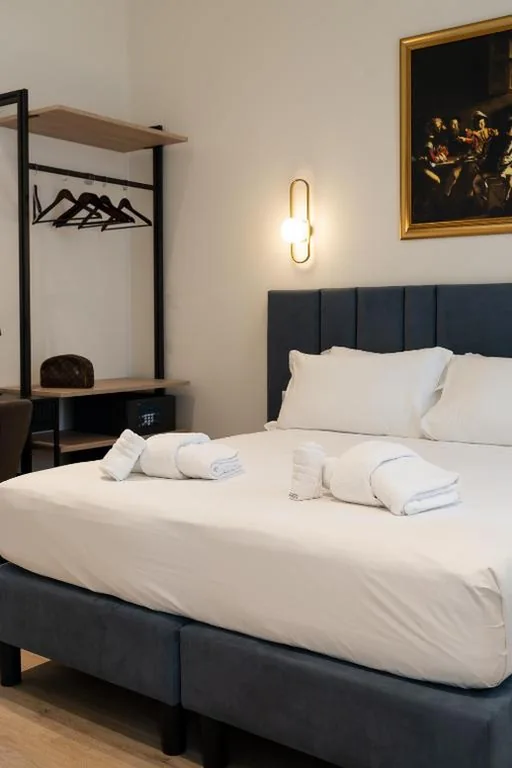 Camera Matrimoniale/Doppia con Letti Singoli — Romart Luxury Rooms