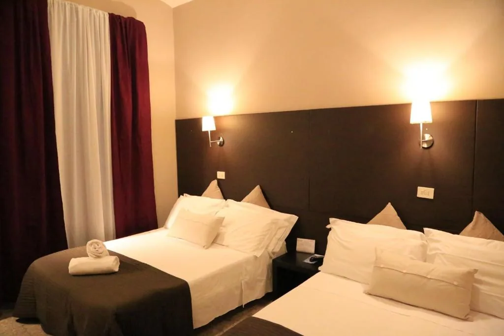 Camera Matrimoniale Economy con Letto Supplementare — Hotel Felice