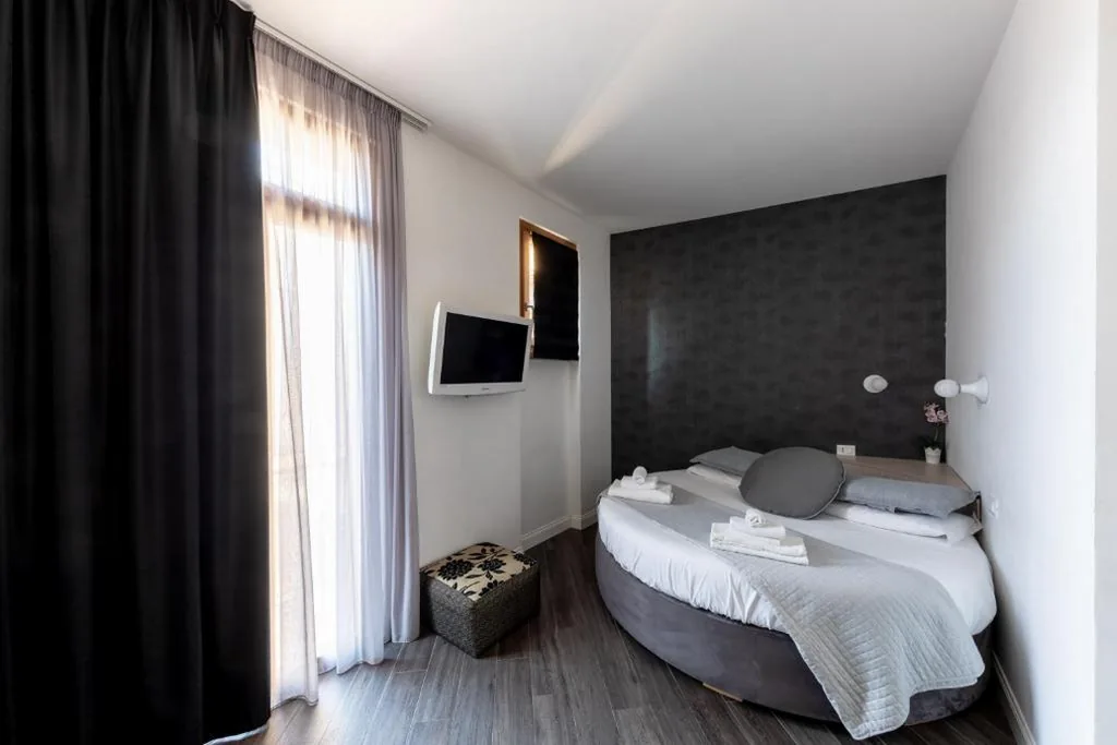 Economy Double Room with City View and Balcony — Blue Inn Luxury Suites