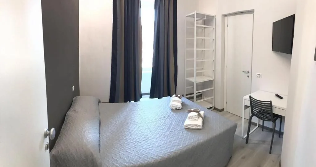 Camera Matrimoniale Economy — Sangiò Guest House
