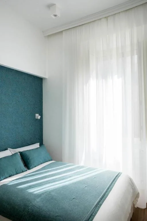 Small Double Room — Four Elements