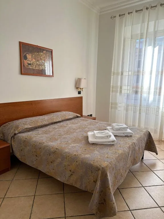 Standard Double Room with Shared Bathroom — Karina Suite