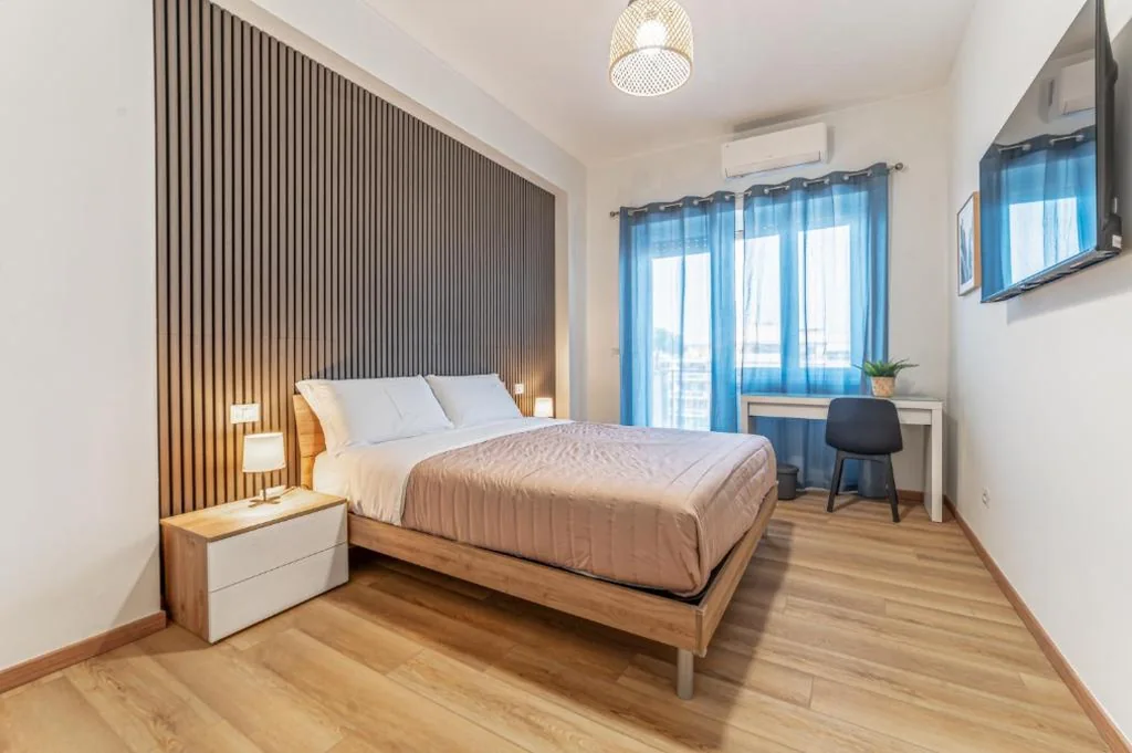 Camera Matrimoniale Standard con Bagno in Comune — Lorena Cozy Rooms – Ospedale Gemelli – WiFi