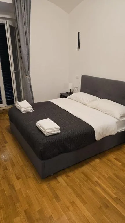 Standard Double Room with Shared Bathroom — Meltin’ Rome Guest House