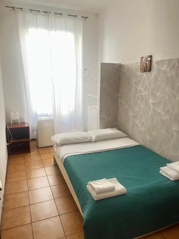 Standard Double Room with Shared Bathroom — Meltin’ Rome Guest House
