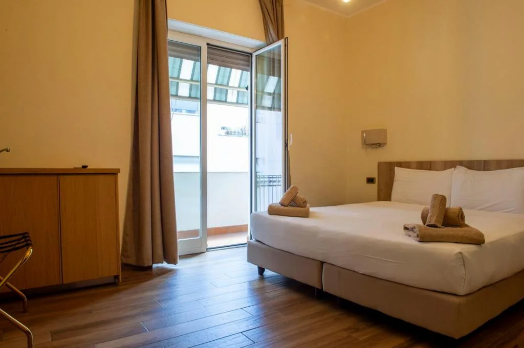 Standard Double Room — JSK Suite