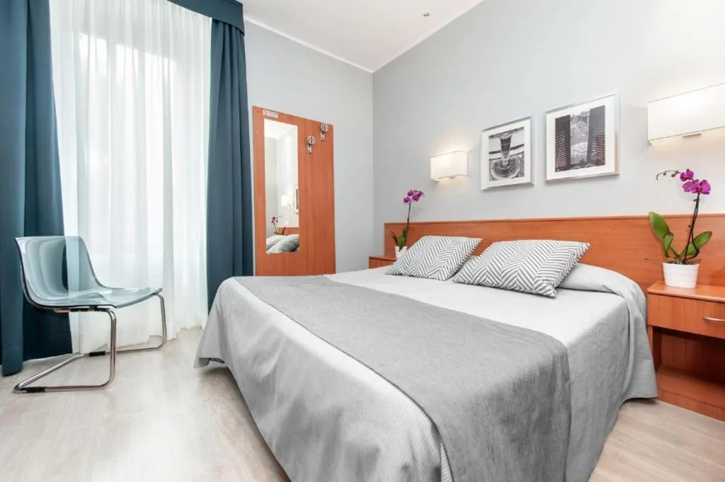 Standard Double Room — Reyes Suite & Rooms