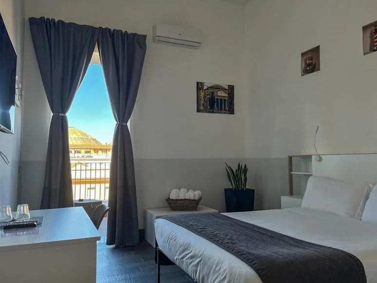Superior Double Room with Balcony — Arch Rome Suites