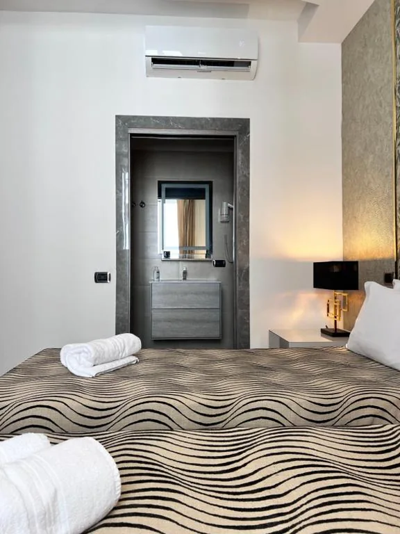 Superior Double Room — Daphne Suites