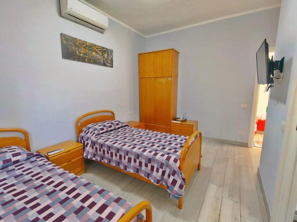 Camera privata con bagno privato e snack di benvenuto
