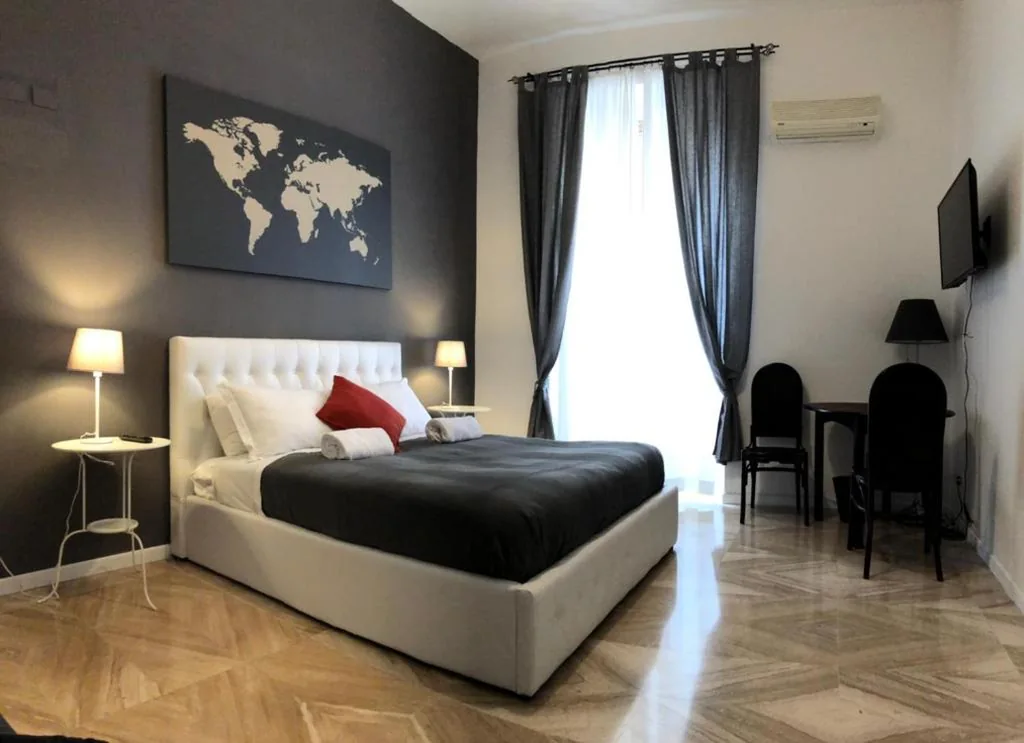 Quadruple Room — 109 SUITES ROMA