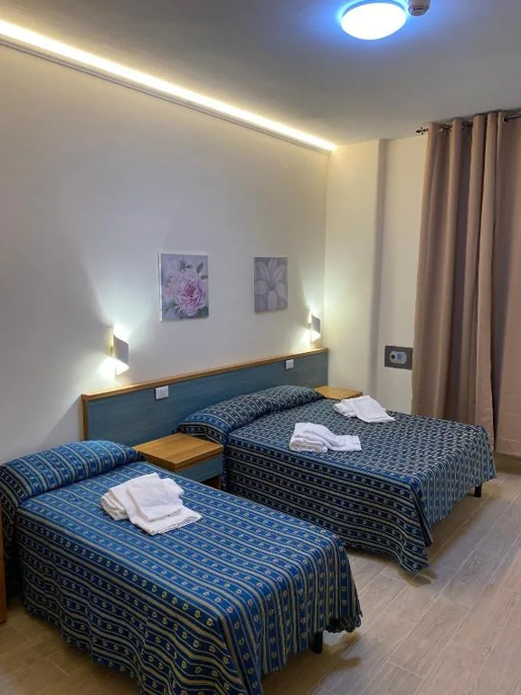 Quadruple Room — Albergo Athena