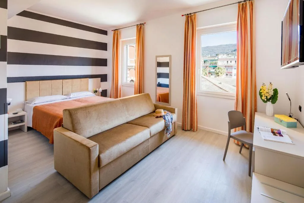 Quadruple Room — Albergo La Piazzetta