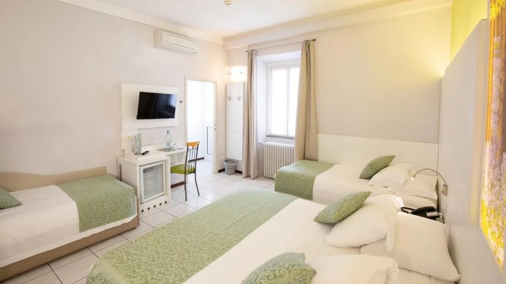 Quadruple Room — Albergo Pesce D’oro