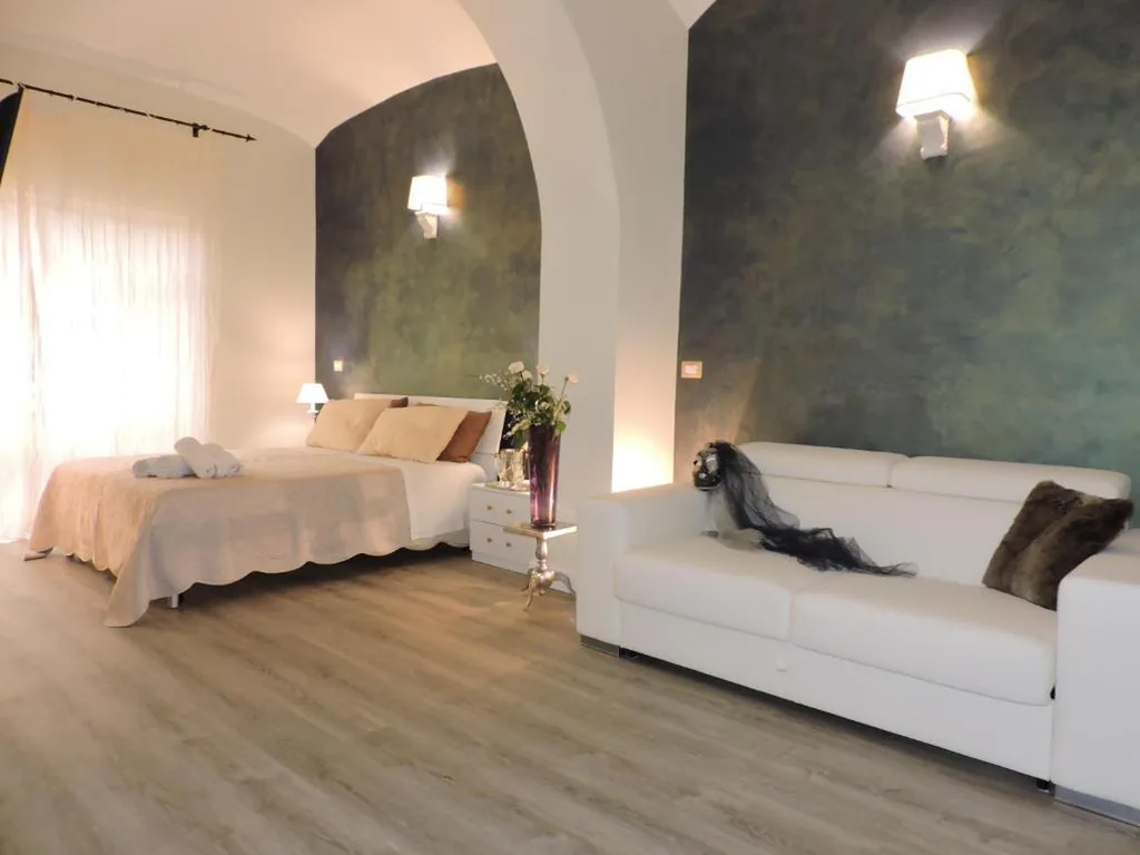 Quadruple Room — Anfiteatro Suite