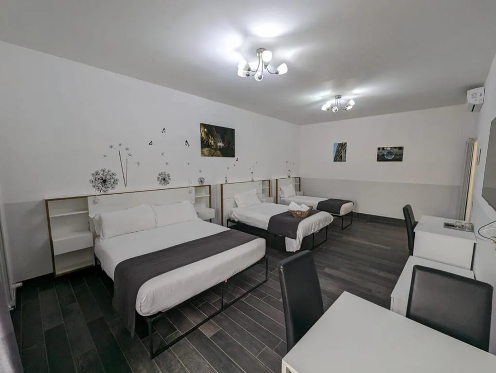Quadruple Room — Arch Rome Suites
