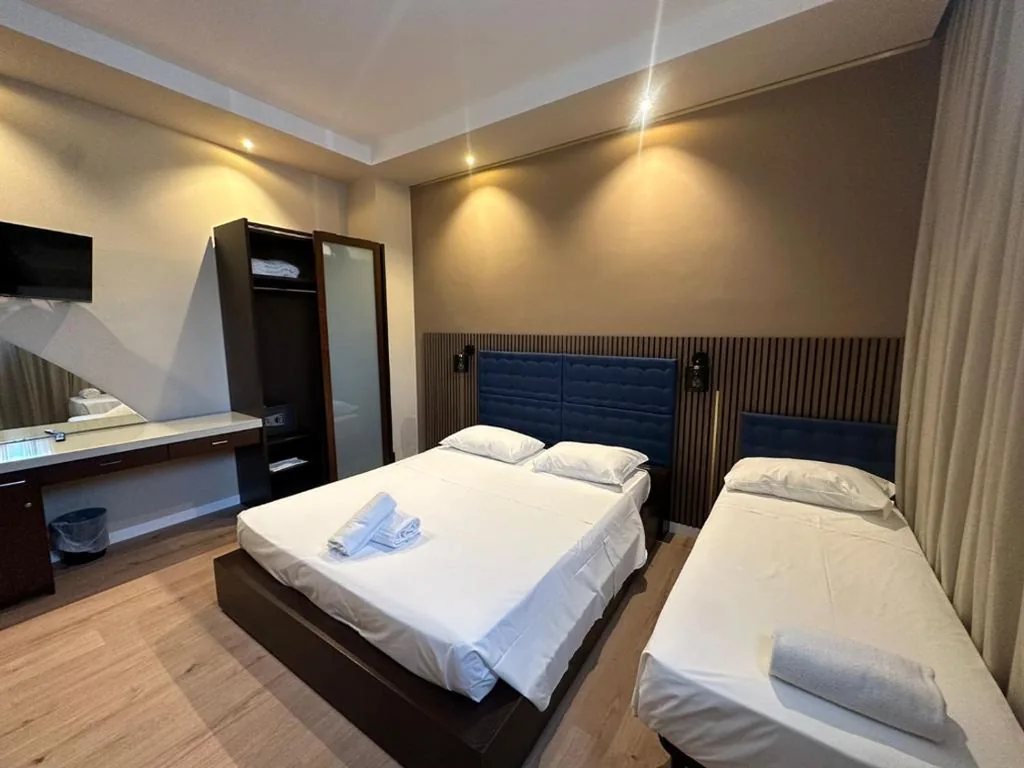 Quadruple Room — Aston Hotel