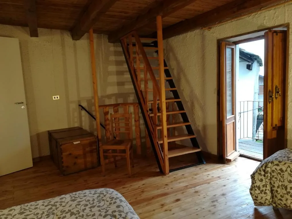 Quadruple Room — Cantina Alpina