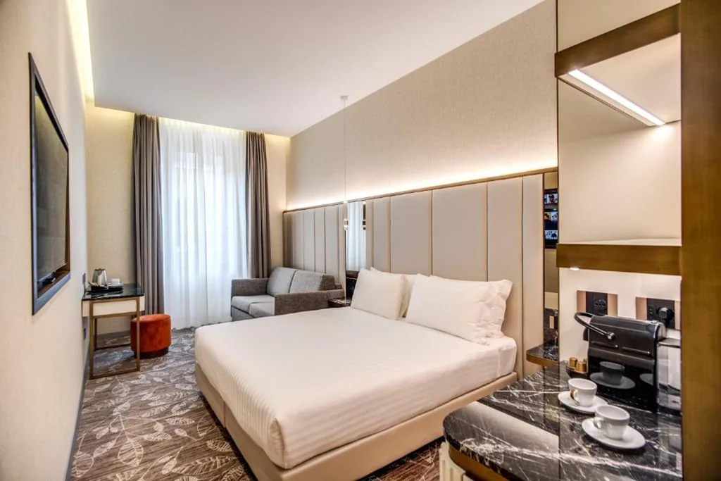 Quadruple Room — CC Palace Hotel