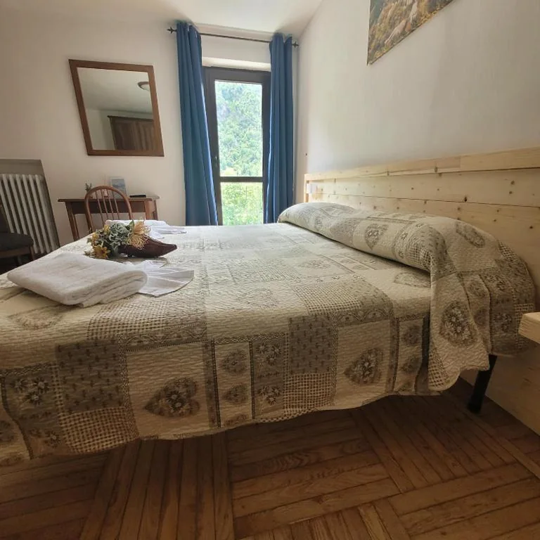 Camera Quadrupla — Chalet Monte Nebius