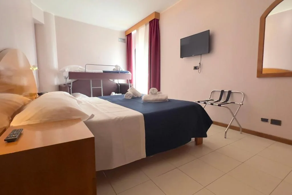 Classic Quadruple Room — BAJAMAR BEACH HOTEL