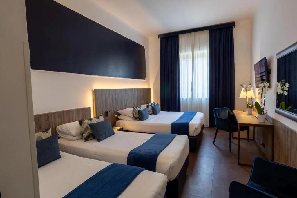 Camera Quadrupla Classic — Grand Hotel Tiberio