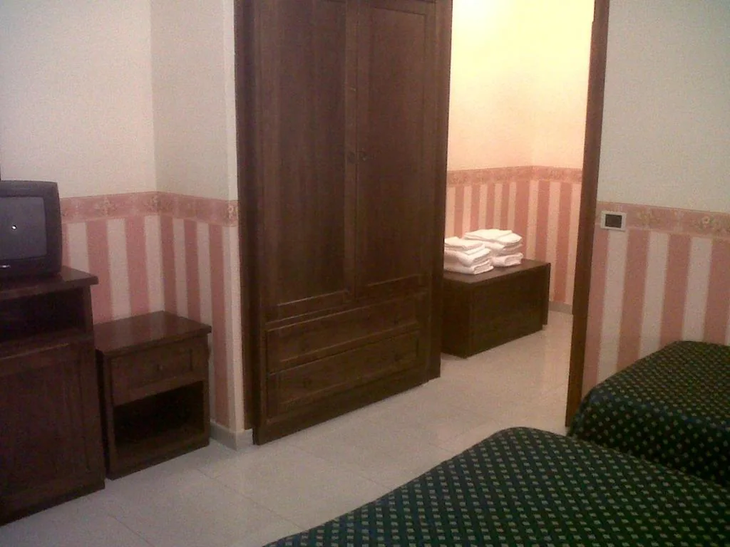 Camera Quadrupla Classic — Hotel Eden Sul Lago